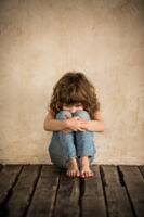 sad child sitting